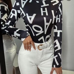 NWOT Black and White Graphic Long Sleeve Bodysuit